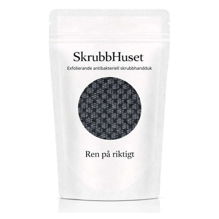 Skrubbhuset exfolierande skrubbhandduk i svart – förpackning